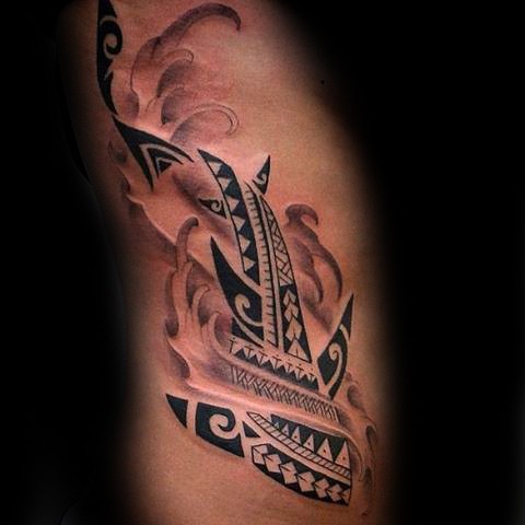 Cool looking shark shaped black ink Polynesian style tattoo