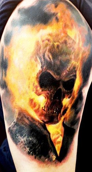 Cool natural looking and colored Ghost rider tattoo on shoulder
