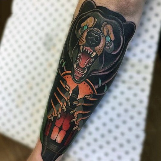 Cool old school style colored bear tattoo on arm