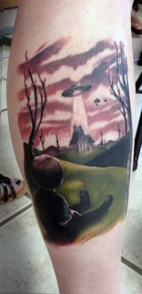 Cool realistic like colored alien ship with lonely house tattoo on leg