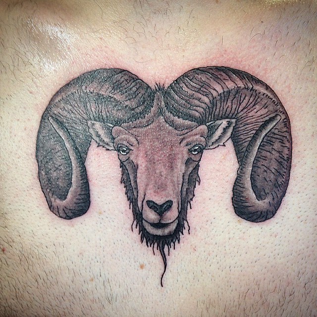 Cool very detailed colored goat head tattoo