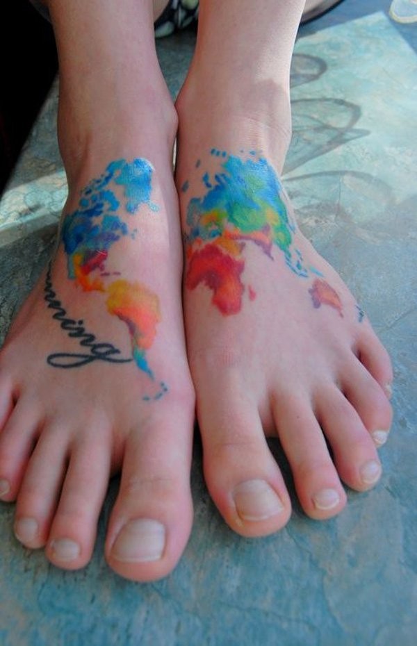 Cool watercolor style colored world map tattoo on feet with lettering