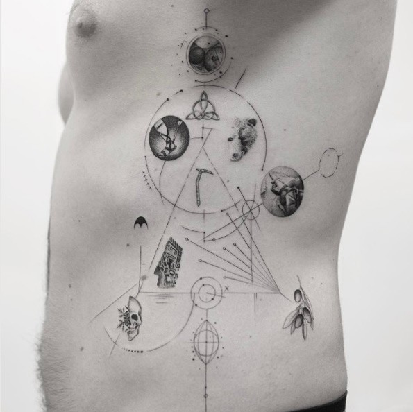 Creative combined black ink side tattoo of strange looking symbols