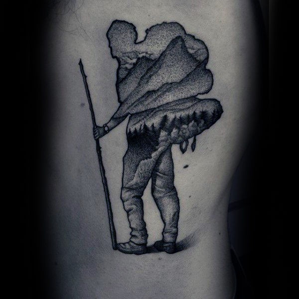 Tatuaggio di stile dotwork dipinto creativo del turista stilizzato con terre selvagge