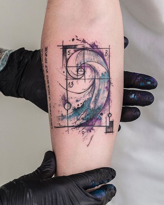 Creative watercolor style forearm tattoo of vortex with geometrical figures