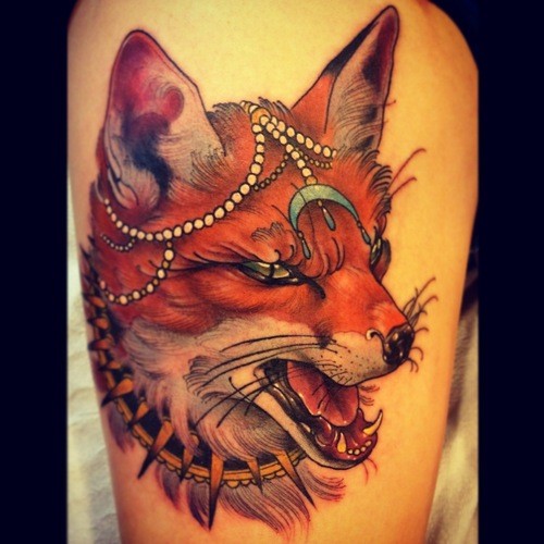 Creepy designed mystical colored evil fox tattoo on thigh
