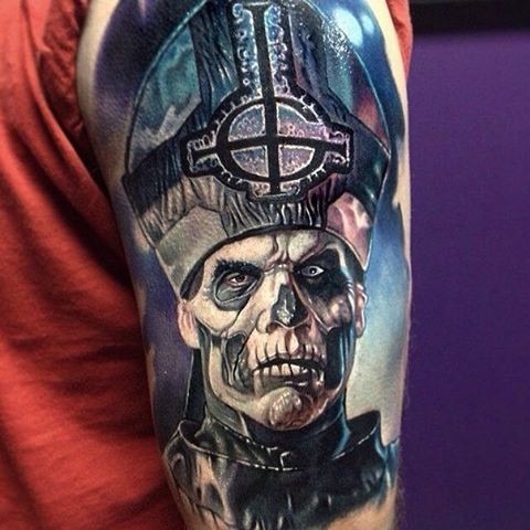 Creepy looking shoulder tattoo of demonic pope