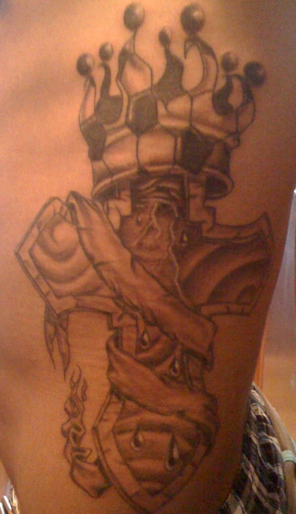 Cross and awesome crown tattoo