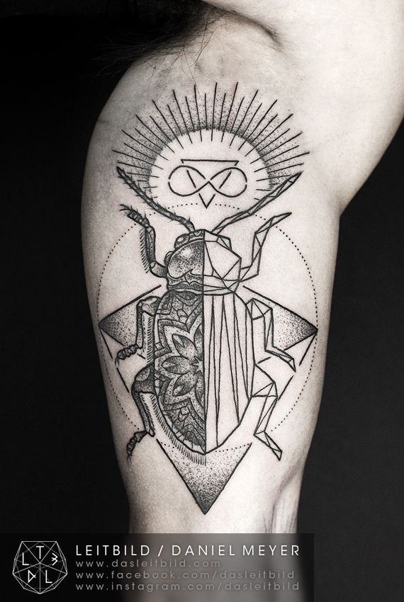 Cult style big black ink mystical tattoo with insect on arm