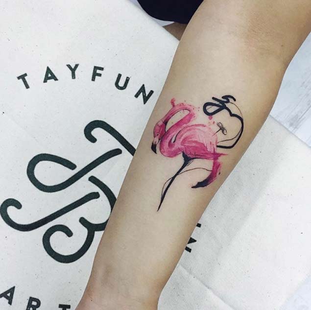 Cute 3D like colored forearm tattoo of flamingo bird