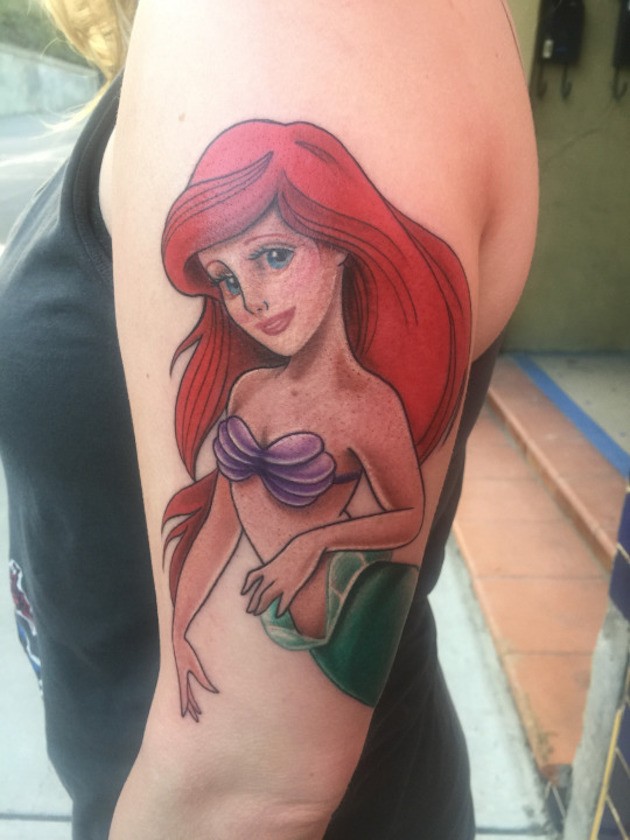Cute accurate painted colorful shoulder tattoo of Ariel mermaid