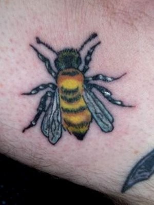 Cute bee tattoo on arm