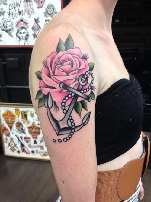 Cute big gray anchor with pink rose tattoo on shoulder