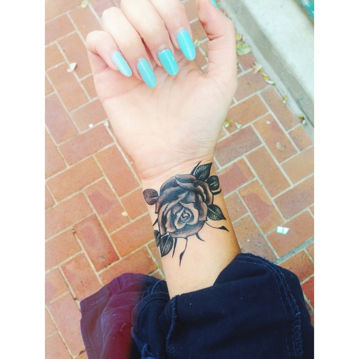 Cute black and gray rose wrist tattoo