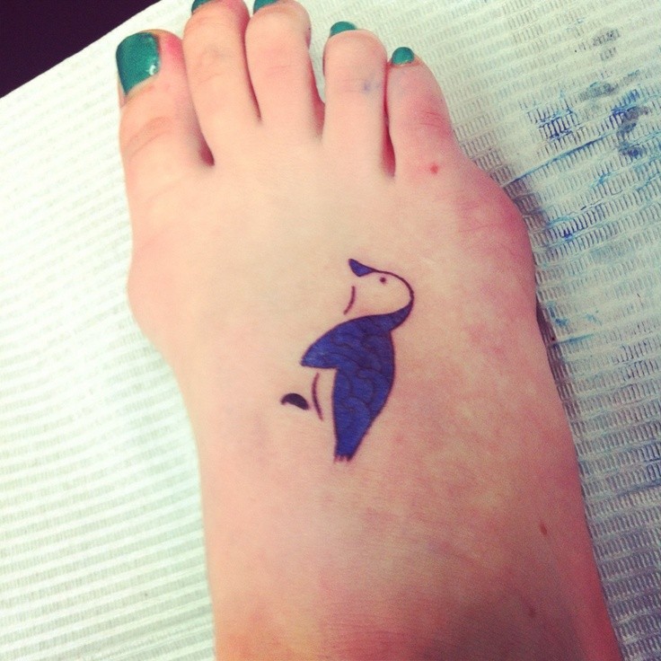Cute blue penguin tattoo for women on feet