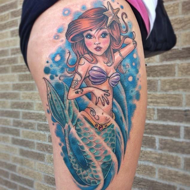 Cute cartoon style colored sexy mermaid tattoo on thigh area