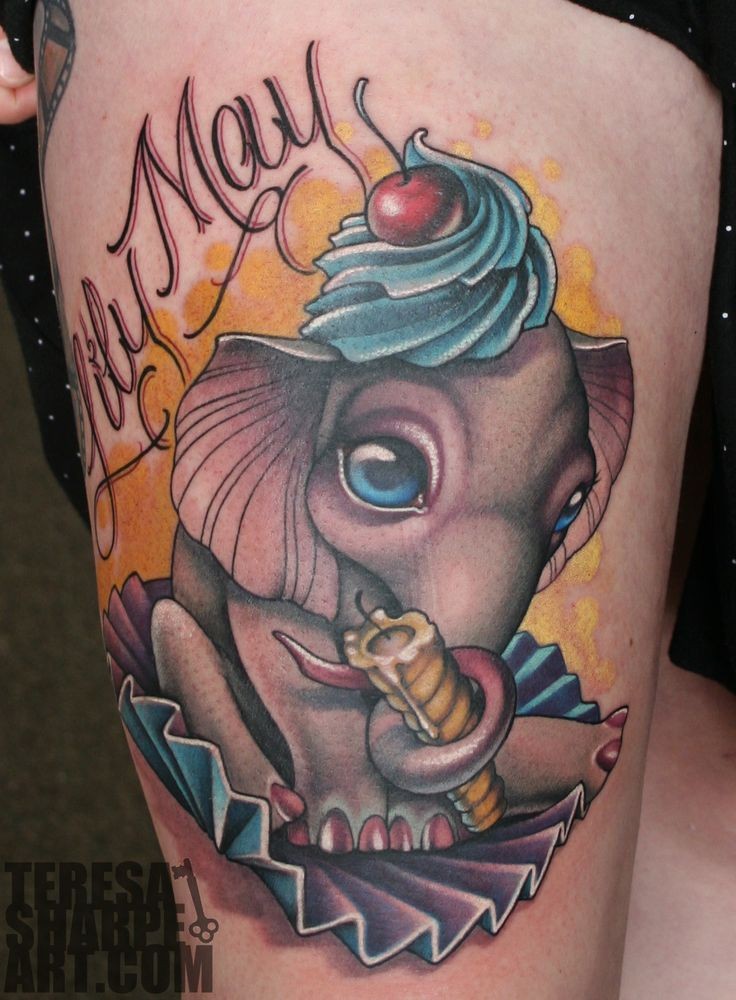 Cute cartoon style colored thigh tattoo of funny elephant with candle and lettering