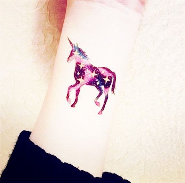 Cute colored little wrist tattoo of sparling unicorn