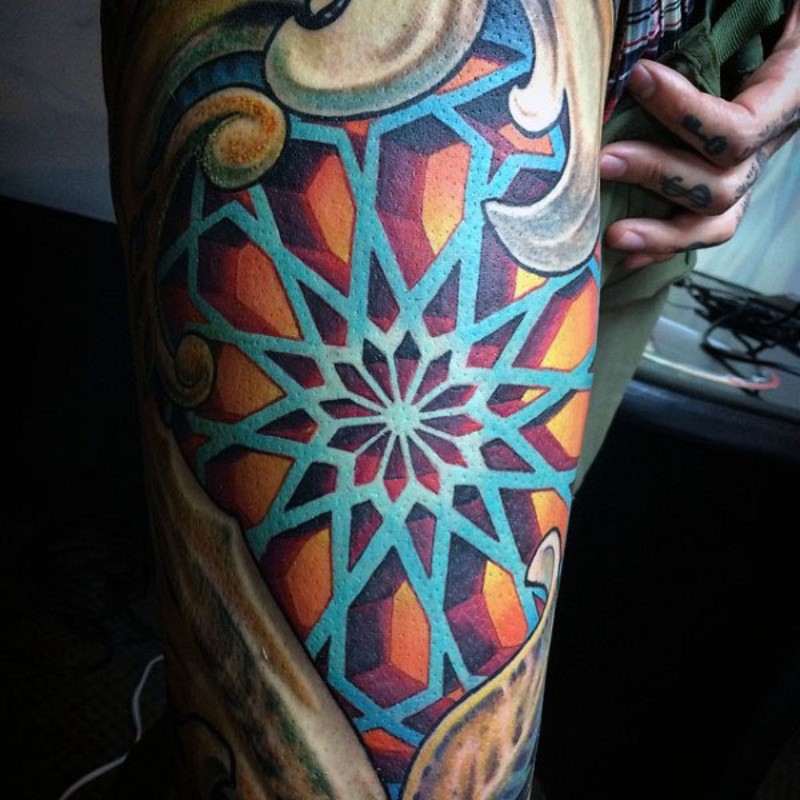 Cute colored star shaped geometrical tattoo on arm