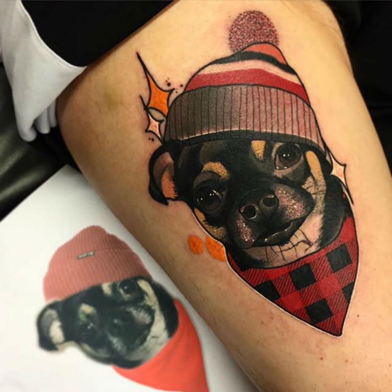 Cute colored thigh tattoo of little dog with hat