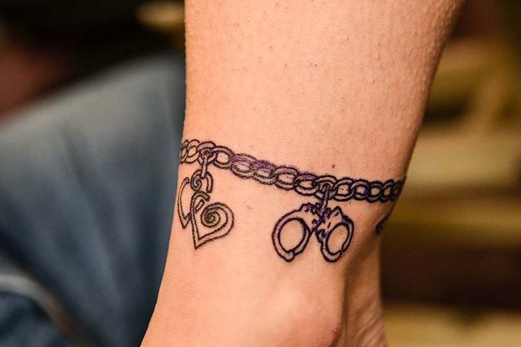 Cute heart shapes and handcuffs ankle bracelet tattoo