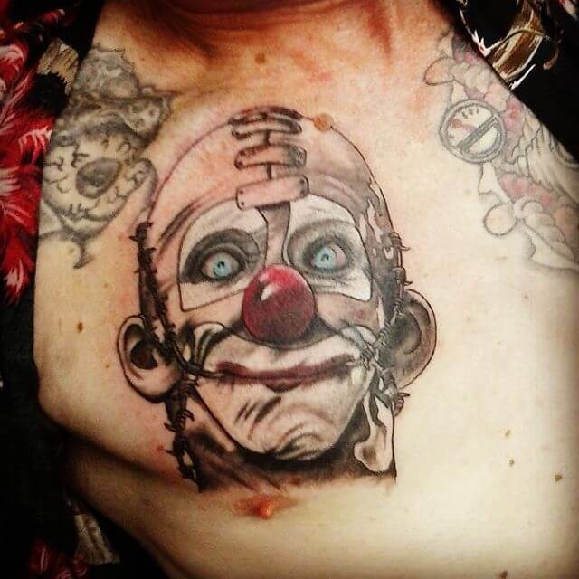 Cute illustrative style creepy clown tattoo on chest