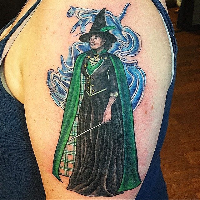 Cute illustrative style shoulder tattoo of Harry Potter movie wizard