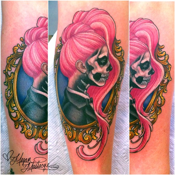 Cute looking colored leg tattoo of skeleton