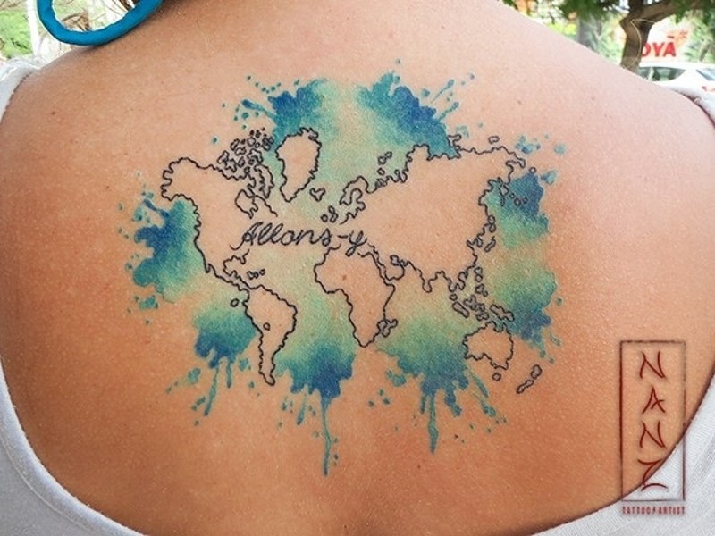 Cute looking colored world map tattoo on back stylized with lettering