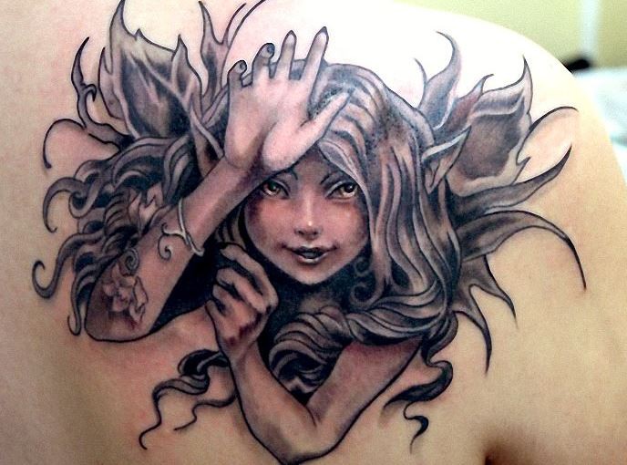Cute mischievous fairy tattoo