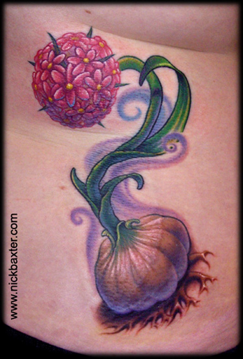 Cute natural looking colored small plant tattoo on side