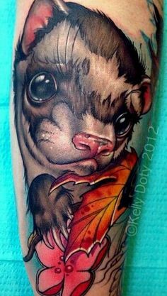 Cute natural looking sad animal portrait tattoo with maple leaf