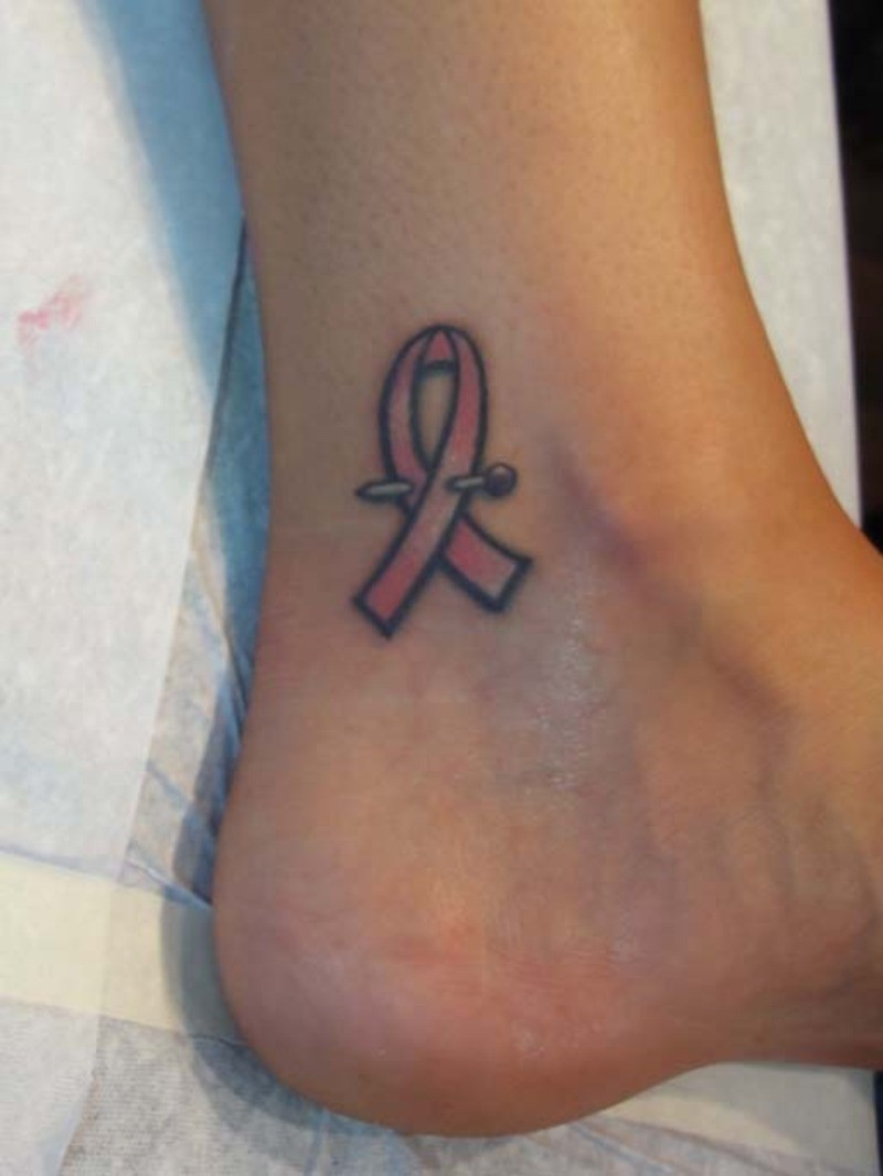 Cute pink ribbon ankle tattoo design