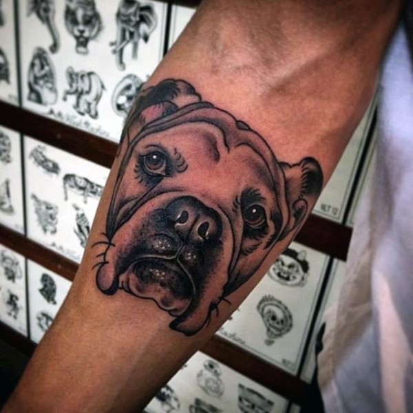 Cute realistic dog&quots portrait detailed tattoo on arm