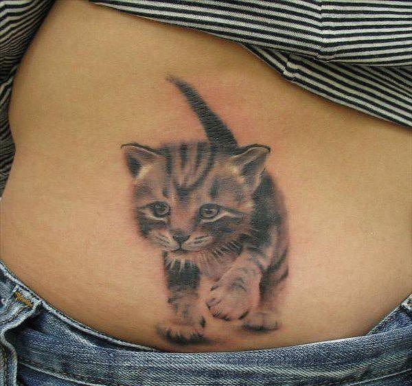 Cute realistic walking kitten tattoo