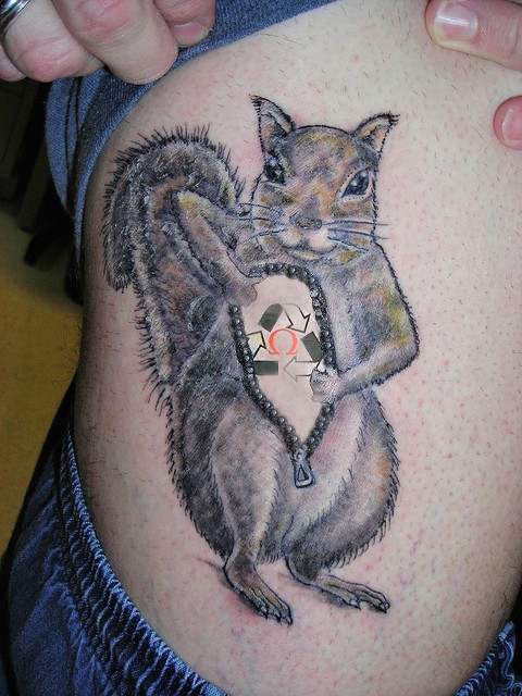 Cute squirrel tattoo with zipper