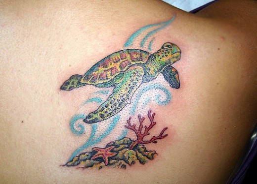 Cute turtle with ocean design tattoo