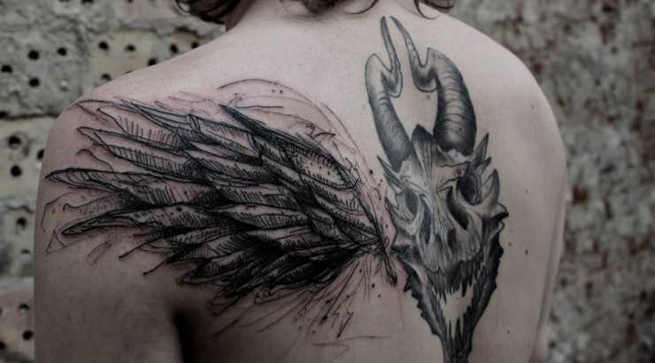 Dark black ink demonic goat skull with wing