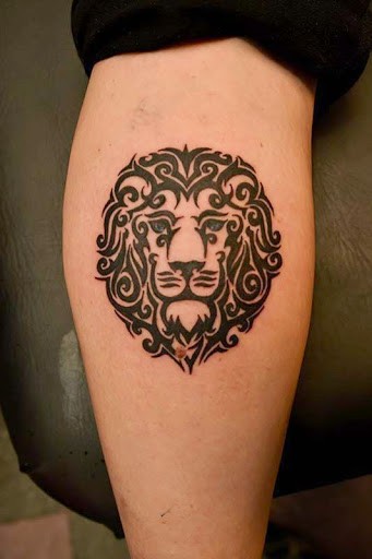 Dark black ink designed with curls lion&quots head tattoo