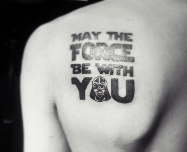 Dark black ink thick Star Wars quote lettering tattoo on shoulder with Darth Vader&quots helmet