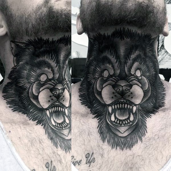 Dark colored furious mad wolf's head neck tattoo in old school style