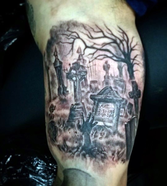 Dark old memorial cemetery tattoo on arm with lettering