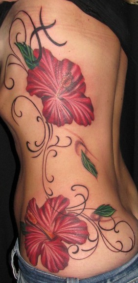 Dark red hibiscus flowers tattoo on ribs