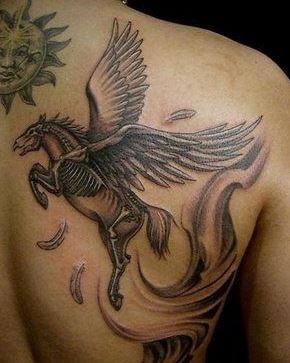 Dark skeleton horse pegasus tattoo on shoulder blade