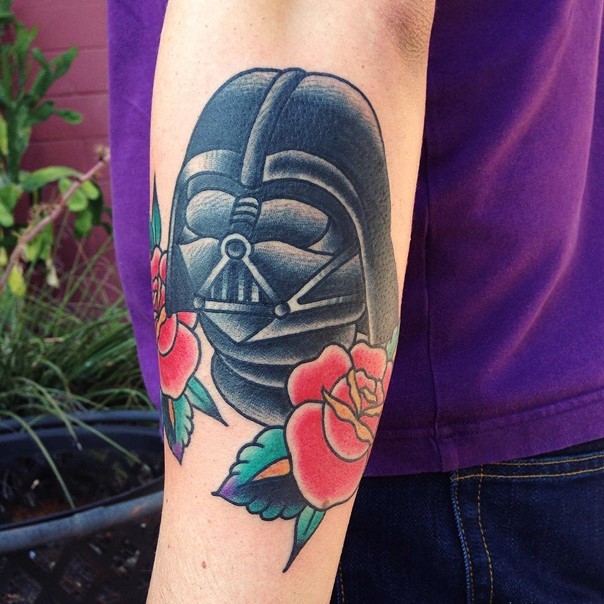 Darth Vader&quots helmet and old school red roses Star Wars themed forearm tattoo