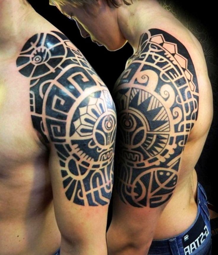 Delightful black polynesian tattoo on shoulder