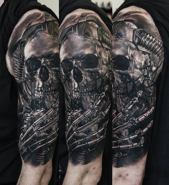 Detailed and colored shoulder tattoo of metallic skeleton