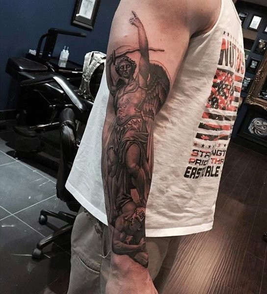Detailed black ink sleeve tattoo of angel warrior fighting demons