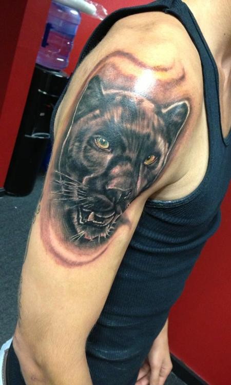 Detailed head black panther tattoo on half sleeve
