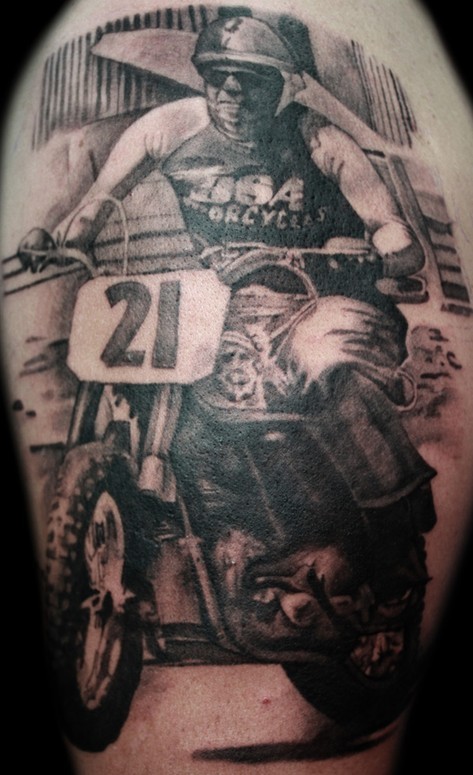 Detailed motorcycle rider tattoo